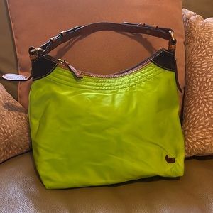 Green shoulder handbag with tan handle